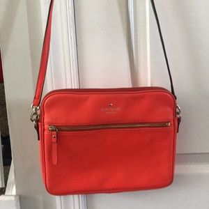 Bright coral colored cross body